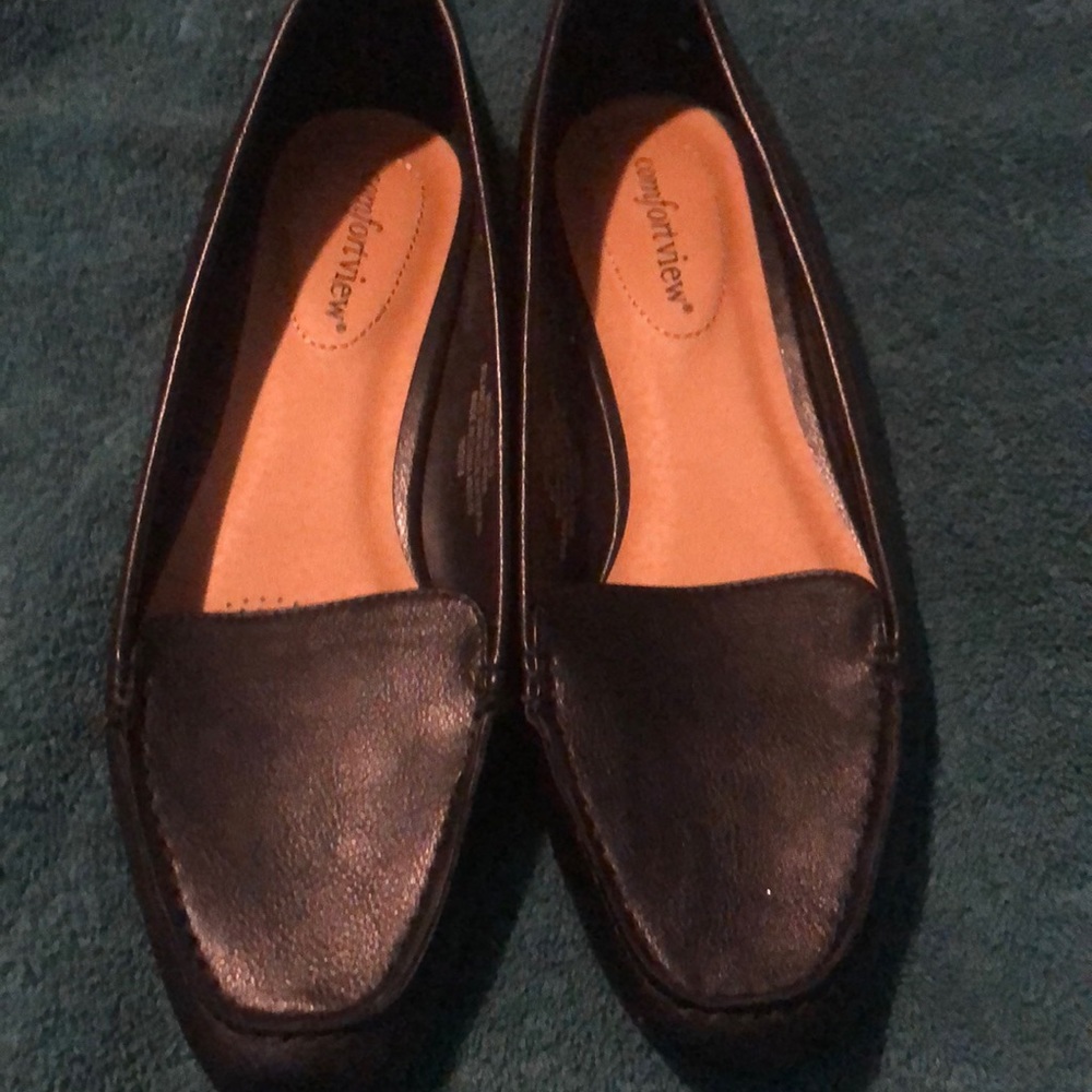 Woman’s black flats